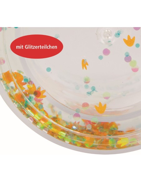 Glitterbeker mert zwevende deeltjes